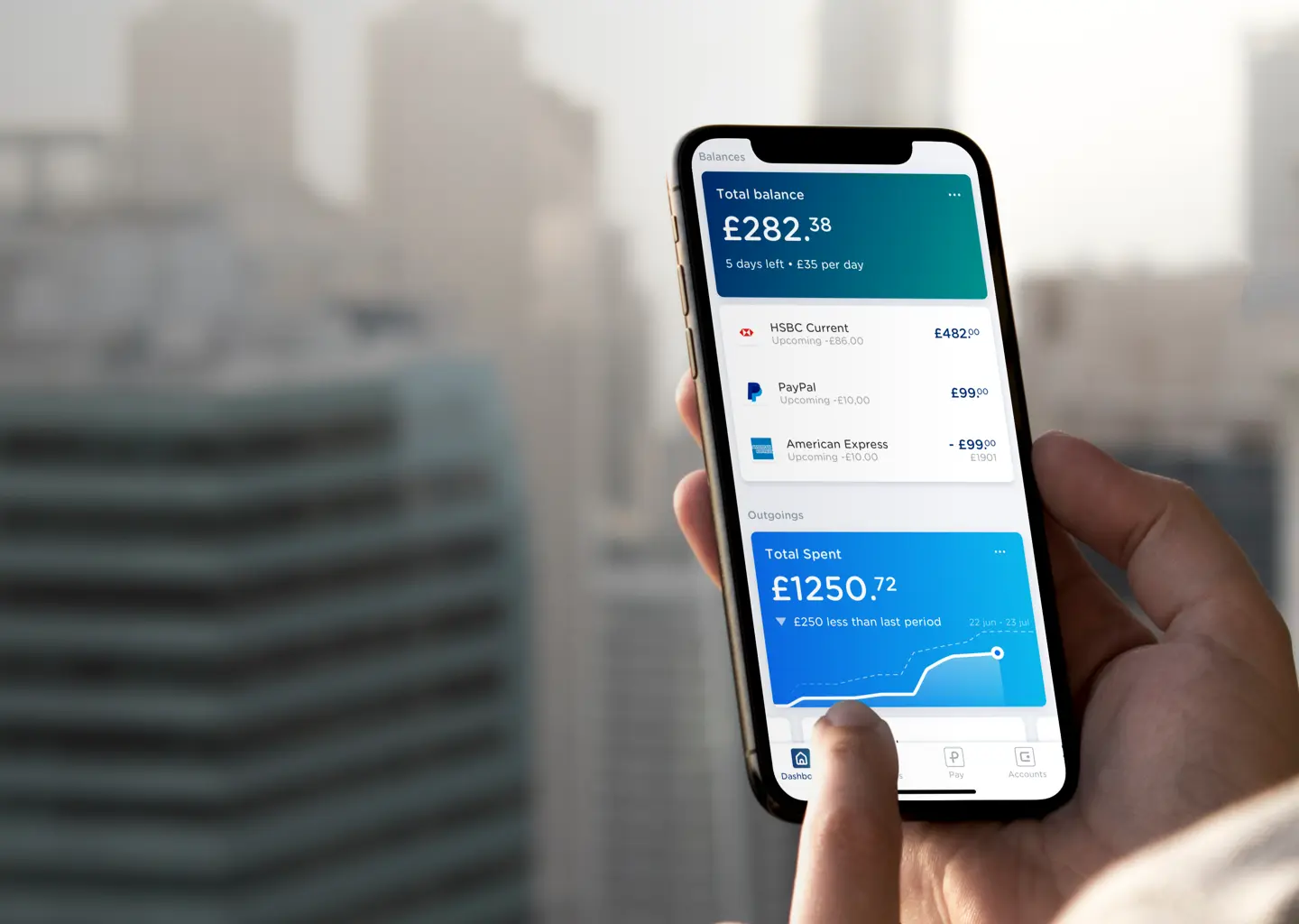 The Yolt smart money manager app shown on a phone.